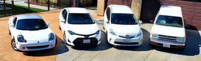 4 white toyotas